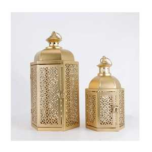 Hexagonal ornate metal lantern pair floral cutout patterns glass panels domed top hook handle warm glowing <b>candles</b> tall - Product Image 2