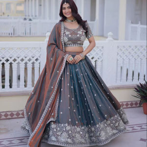 Wunderschöner Seiden-Lehenga-Choli mit Stickerei und Paillettenarbeit präsentiert. - Product Image 1