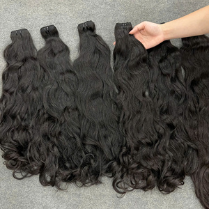 ผมเวียดนามแท้ 100% เรมี่ ซุปเปอร์ดับเบิ้ลดรอน แบบเป็นมัด 12A ลอนธรรมชาติ ต่อผม ราคาโรงงาน - Product Image 1