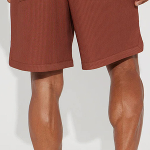 กางเกงขาสั้นผู้ชายเนื้อผ้านุ่มสบายสำหรับฤดูร้อน/สีพื้น ออกแบบโลโก้ได้ตามต้องการ ปี 2026 ราคาถูกสำหรับการสั่งซื้อแบบขายส่ง ทรงหลวมใส่สบาย - Product Image 6