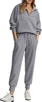 Ensemble de survêtement gris côtelé pour femme avec sweat-shirt demi-zip et pantalon long coupe droite, idéal pour l'automne, avec poches latérales et logo frontal