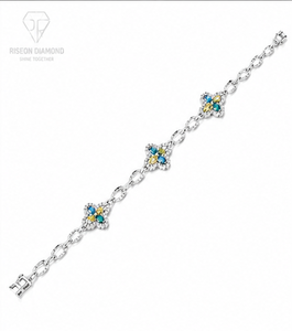 Elegante pulsera tipo station en oro blanco de 18 quilates con motivos florales y diamantes cultivados en laboratorio de colores vibrantes en tonos azul, amarillo y verde. - Product Image 2