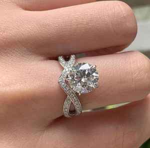 แหวนเพชรทรงกลมเจียระไนแบบบริลเลียนท์ ดีไซน์เฉพาะตัว เพชรเพาะเลี้ยงในห้องปฏิบัติการ ทองคำขาว สำหรับงานหมั้น งานแต่งงาน ของขวัญวันครบรอบสำหรับเธอ - Product Image 1