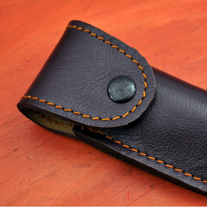 Cuchillo de caza Imperial de acero de Damasco con hoja de punta caída, filo biselado y funda de cuero - Product Image 6