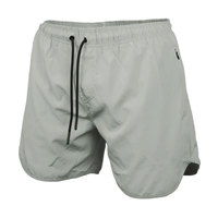 Short de sport pour homme à taille élastique mi-haute, séchage rapide, respirant, en coton teint uni, idéal pour la gym et l'entraînement – Vente chaude, personnalisable avec logo