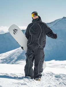Pantalon de ski unisexe imperméable et chauffant coupe-vent 10000 mm - Polyester Tex pour activités de neige en extérieur, fermeture à cordon, style cargo, doublure polaire - Product Image 2