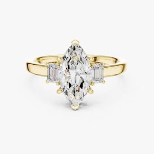 Anillo de compromiso de oro amarillo de 9K al por mayor con diamante de laboratorio de corte marquesa de 1.50 quilates y tres piedras con piedras laterales de baguette - Product Image 1