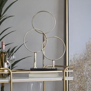 Table ronde en métal qui ajoute une élégance moderne et un charme artistique aux intérieurs élégants de la maison ou du bureau - Product Image 1