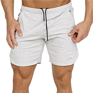 Shorts de bain décontractés pour hommes à taille mi-haute élastique, unis, doux, durables, respirants, écologiques, séchage rapide, service OEM, pour le cardio et le cyclisme - Product Image 1
