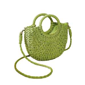 Complementa tus atuendos para el clima soleado con este encantador bolso de hilo natural con una silueta curva marrón y asas, disponible hoy. - Product Image 4