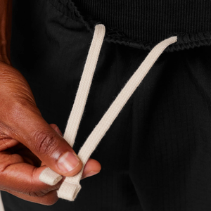 Pantalon de sport noir coupe droite oversize pour homme, style streetwear, taille élastique, idéal pour l'entraînement - Product Image 6