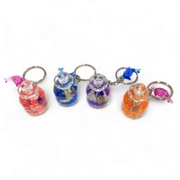 Mini porte-clés liquide bouteille acrylique avec impression UV Dolphin Accent Souvenir durable pour les événements promotionnels