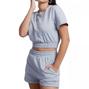 Ensemble deux pièces uni col rond manches courtes ourlet élastique Top court et taille élastique poche latérale Short ensembles de survêtement femmes - Product Image 4