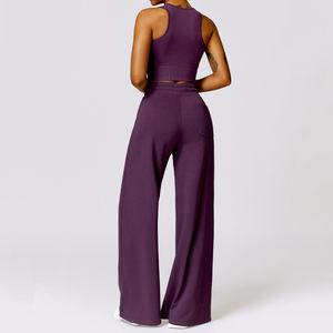 Conjunto de yoga de dos piezas rosa: Top corto sin mangas con espalda cruzada y pantalones de pierna ancha de cintura alta, color liso, transpirable, con cintura elástica y diseño retorcido. - Product Image 6