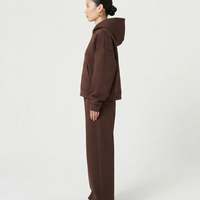 Ensemble de survêtement pour femme, fabriqué en usine OEM, en coton/polyester, avec sweat à capuche oversize à épaules tombantes et pantalon large, coupe ample, pour l'extérieur