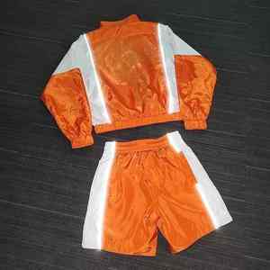 Ensemble short de sport pour femme avec logo personnalisé, coupe-vent respirant, streetwear en nylon uni, grandes tailles, vente en gros, collection Printemps 2026 - Product Image 5