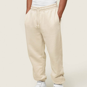 Jogging décontracté pour hommes en toile premium, coupe oversize, léger et respirant, avec poches latérales, personnalisable avec logo, vente en gros - Product Image 1