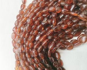 Perles de grenat Hessonite naturel, lisses et polies, de forme ovale, de 5x7 à 8x10 mm, pour la fabrication de bijoux - Product Image 2