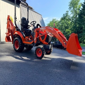 Potente tractor Kubota BX23S con sistema hidráulico de alta resistencia, cargador frontal, retroexcavadora y cómoda cabina de control para el operador. - Product Image 3