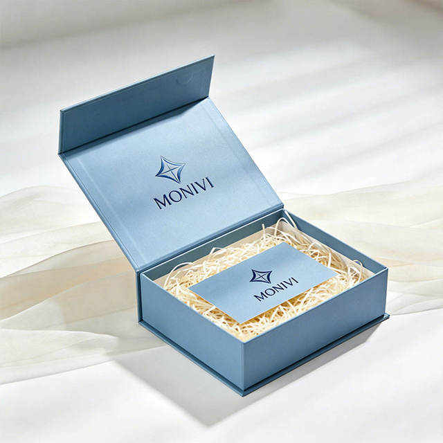 Blue Electronic Component Packaging Box With Custom Pattern and Foam Insert for Secure Storage and Brand Promotion
