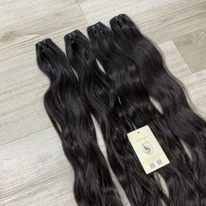 Vente en gros de haute qualité doux vietnamien naturel noir brut vierge corps ondulé Curl pour Genius trame Extensions de cheveux haute cheveux humains - Product Image 3
