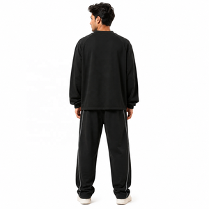 Ensemble de survêtement unisexe d'hiver en coton tricoté 100 %, comprenant un sweat à capuche oversize et un pantalon de jogging à jambe large avec passepoil contrastant, coupe décontractée - Product Image 3