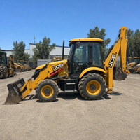 Chargeuse-pelleteuse JCB 4CX d'occasion avec moteur fiable