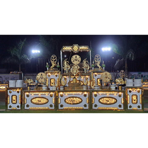 Comptoir de buffet pour mariage indien, souvent éclairé par des lumières et décoré de finitions dorées ou à motifs. - Product Image 1