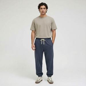 OEM personalizado pantalones de chándal de gran tamaño Raw Hem cintura elástica relajado Jogger pantalones de chándal de pierna ancha pantalones de chándal de peso pesado - Product Image 1