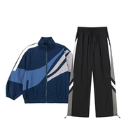 Ensemble survêtement coupe-vent personnalisé en nylon avec logo brodé, sweat à capuche patchwork et pantalon baggy pour homme, style streetwear