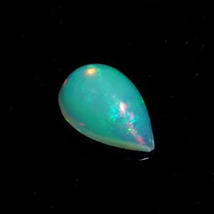 พลอยโอปอลไฟสีขาวธรรมชาติ HAYAAT GEMS รูปทรงลูกแพร์เจียระไนแบบคาโบชอง น้ำหนัก 1.50 กะรัต พร้อมสีสันเปลี่ยนแปลง - Product Image 4