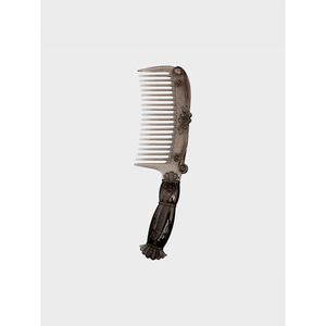 Pettine con disegno di ascia antico - Product Image 1
