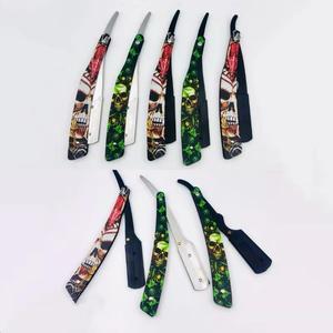 Navaja Quirúrgica Plegable Morje de Acero Inoxidable con Hoja Única y Mango de Plástico con Diseño de Calavera para Barbería - Product Image 2
