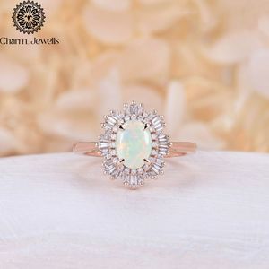 Bague de fiançailles ovale en moissanite pour femme, en or rose et argent, sertie de griffes, certifiée IGI, style classique et romantique, par Charm Jewells - Product Image 3