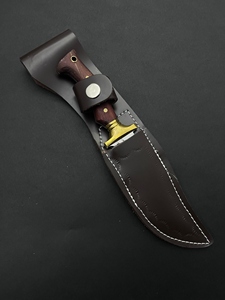 Cuchillo de Caza y Camping de Acero Inoxidable 4116, Hoja Fija con Borde Parcialmente Dentado, Mango de Madera de Paddock y Funda de Cuero - Product Image 6