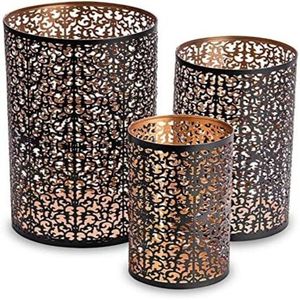 Portavelas votivo de metal hecho a mano que combina la artesanía experta con la luz relajante de las velas para interiores que inspiran atención plena. - Product Image 1