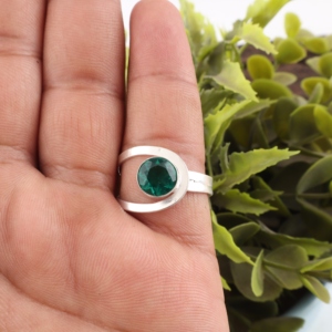Niharika Gems Luxury <b>Silver</b> Plated Green <b>Emerald</b> Gemstone <b>Ring</b> with Channel Setting for Unisex Wedding & Party Occasions - Product Image 1