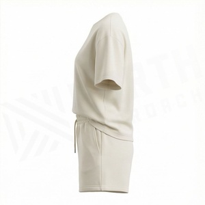 Ensemble décontracté 2 pièces en coton tricoté pour femme : T-shirt à col rond et manches courtes brodé, couleur unie, coupe ample, au-dessus du genou - Product Image 3