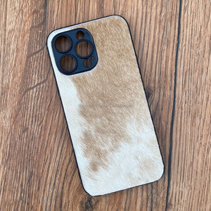 Nuova custodia per telefono in pelle con <span class=keywords><strong>capelli</strong></span> genuini in pelle di vacchetta occidentale custodia per telefono di lusso Vintage personalizzata per telefono 15 Pro Max - Product Image 2
