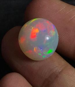 Opale d'Éthiopie naturelle multicolore et chatoyante, cabochon rond. - Product Image 4