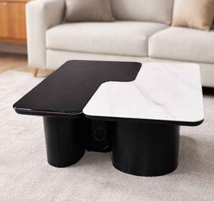 Mesa de centro moderna de dos tonos con una superficie negra y una de mármol blanco sobre una base gruesa de doble cilindro negro, a precio de mayorista. - Product Image 1