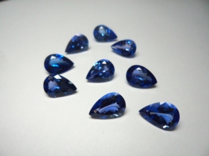 Tanzanita Natural de 7x10mm, 9 Piezas, Calidad 3A, Corte Facetado en Forma de Pera, para Joyería, Piedra de Nacimiento Suelta, GEMFORTE INC - Product Image 1