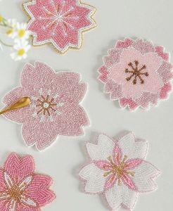 Sous-verres à thé de style floral, isolation inédite, décoration de bureau et cadeau d'accompagnement, style perles de riz, artisanat d'exportation - Product Image 1