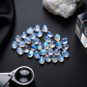 Cabujón de Piedra Lunar Arcoíris Natural 12x16mm Forma Ovalada Fuego Azul Gema Suelta con Base Plana para Fabricación de Joyas - Product Image 1