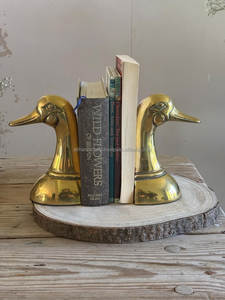 Golden Duck Metal Antique Brass <b>Bookends</b> with Elegant Curves – A Decorative and Functional Desk Accessory - Product Image 1