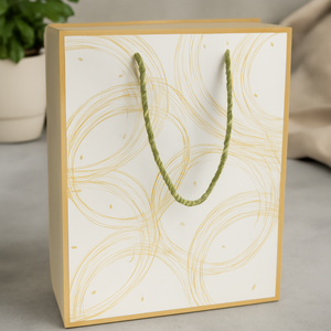Elegant White Paper Gift Bag with Gold Abstract Swirl <b>Design</b> <b>and</b> Rope Handle Custom Logo <b>Packaging</b> for Wedding Retail or Events - Product Image 2