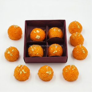 Artisanal Festive Ladoo Wax Art – Intricate Textured Soy Wax Spiritual Decor - Product Image 2