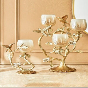 Gold twisted ribbon metal candelabra featuring three tall taper <b>candle</b> holders, available at wholesale prices. - Product Image 4