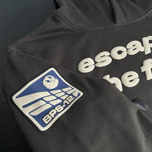 Sudaderas con Capucha Modernas y Elegantes de Manga Larga con Estampado Puff, Transpirables, Unisex, con Logotipo Bordado, 100% Algodón, Bolsillo Extra Grande - Product Image 3