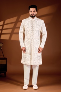 Ensemble Sherwani Col Mandarin Ivoire à Bordure Florale Pastel, Ceinture en Maille Diamantée et Motif Paisley 3D Codé - Product Image 1